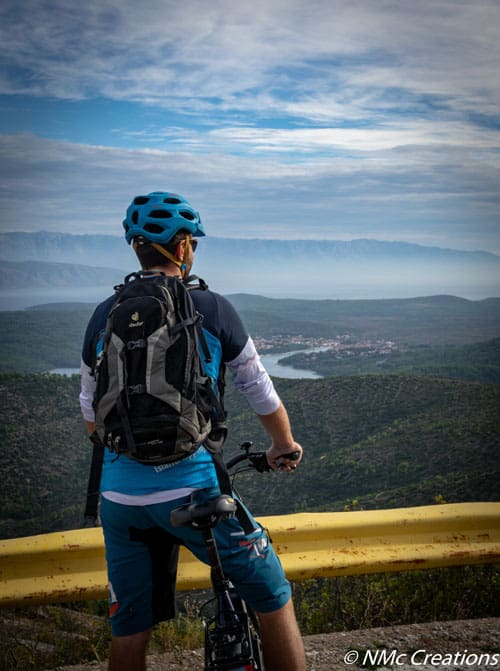 Cyclist enjoying the view of Hvar